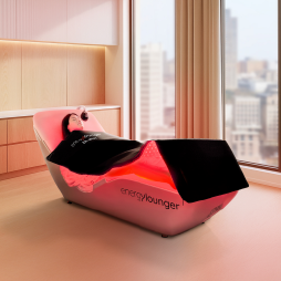 Modern red and black chair with 'Fresleybunker' branding in a room with large windows.
