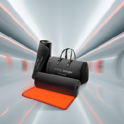 Three black cylindrical products with handles on a gray surface with red accents, set against a dynamic background.