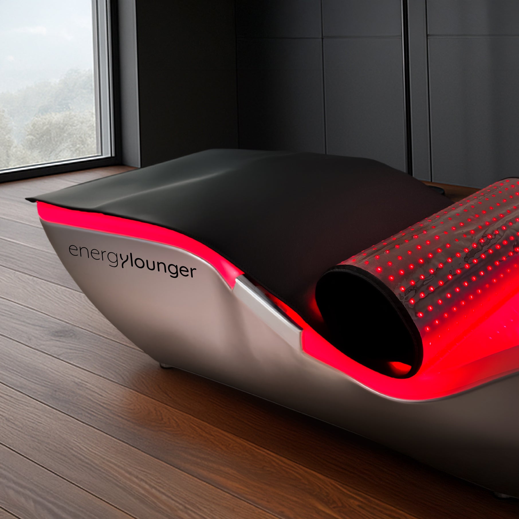 Modern energy lounger with red accents on a wooden floor