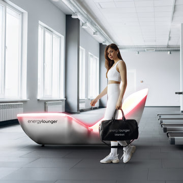Woman holding a 'energylounger' bag in a modern indoor setting