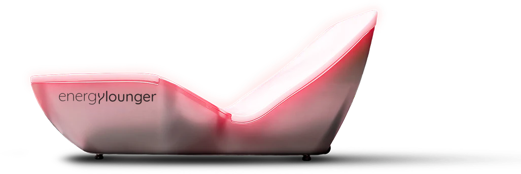 Energy Lounger red-light wellness chair with curved ergonomic design.